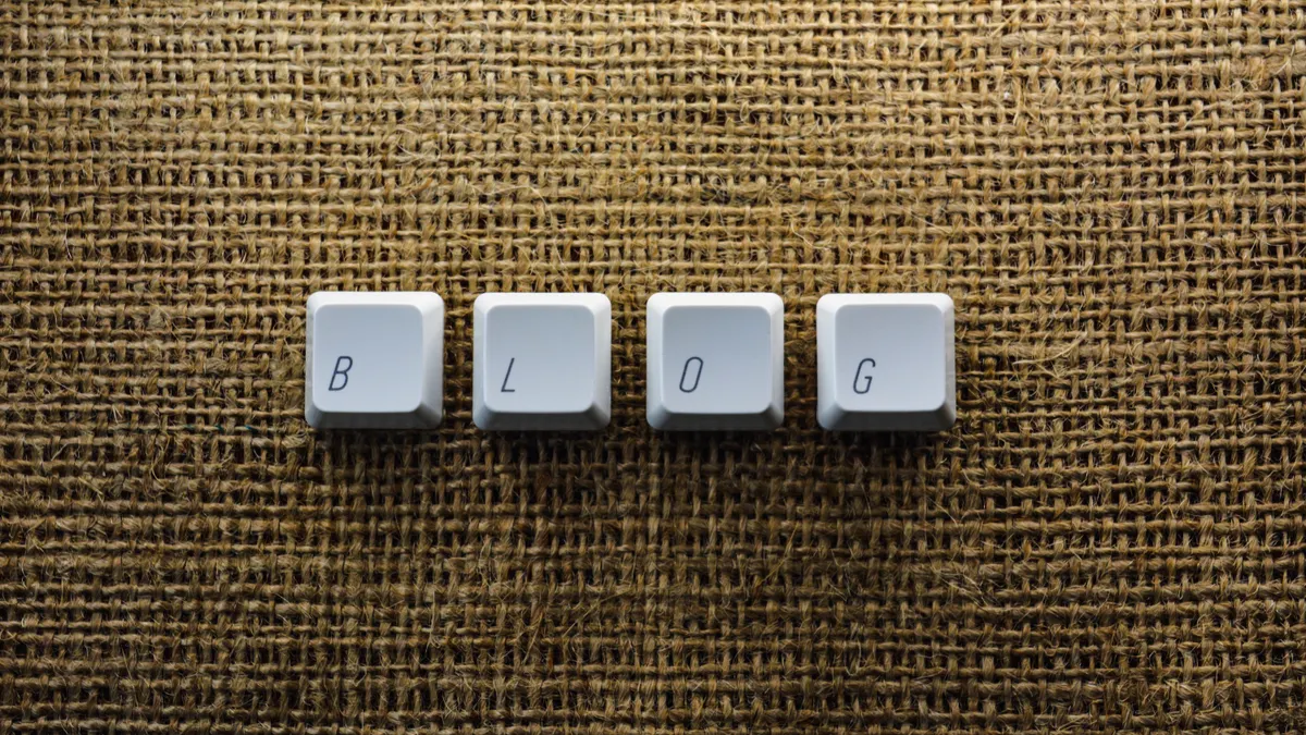 Best AI Blog Writers for Blog Posts: A Practical Roundup — Close-up of Individual Keyboard Keys Making a Word "Blog"