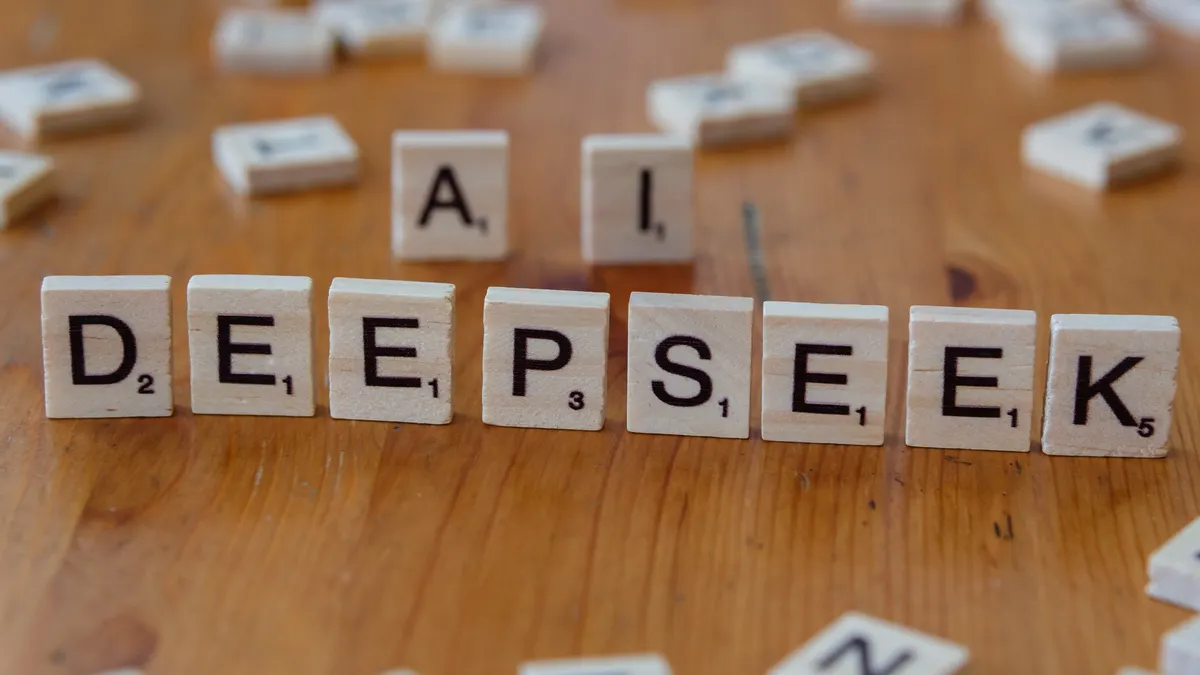 What Are the Risks of Using AI Blog Writers? — Scrabble Tiles Spelling Deepseek AI Concept